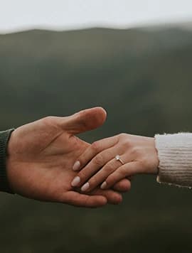 Hands holding each other